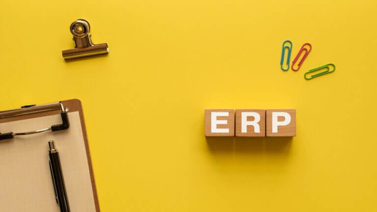 There is word card with the word ERP. It is an abbreviation for Enterprise Resources Planning as eye-catching image.