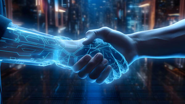 Handshake between a cyber hand hand a human hand – Technologies and artificial intelligence concept