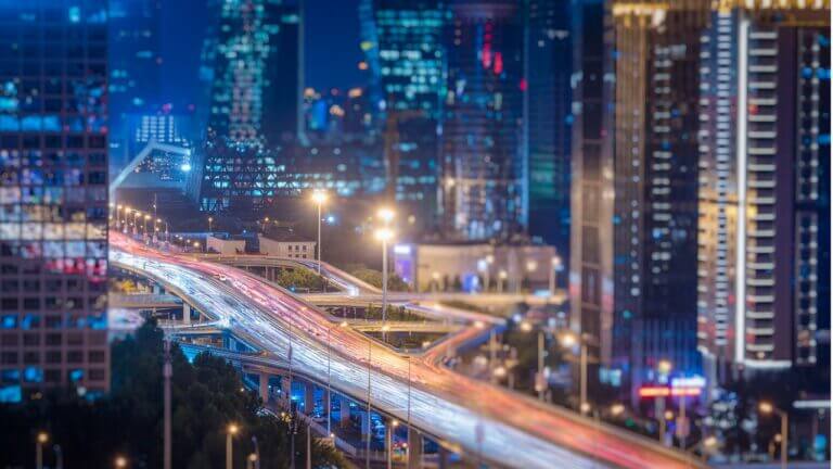 blurred traffic light trails on road